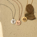 creative image of the three variants of Custom Pet Portrait Necklace - silver, rose gold, and gold